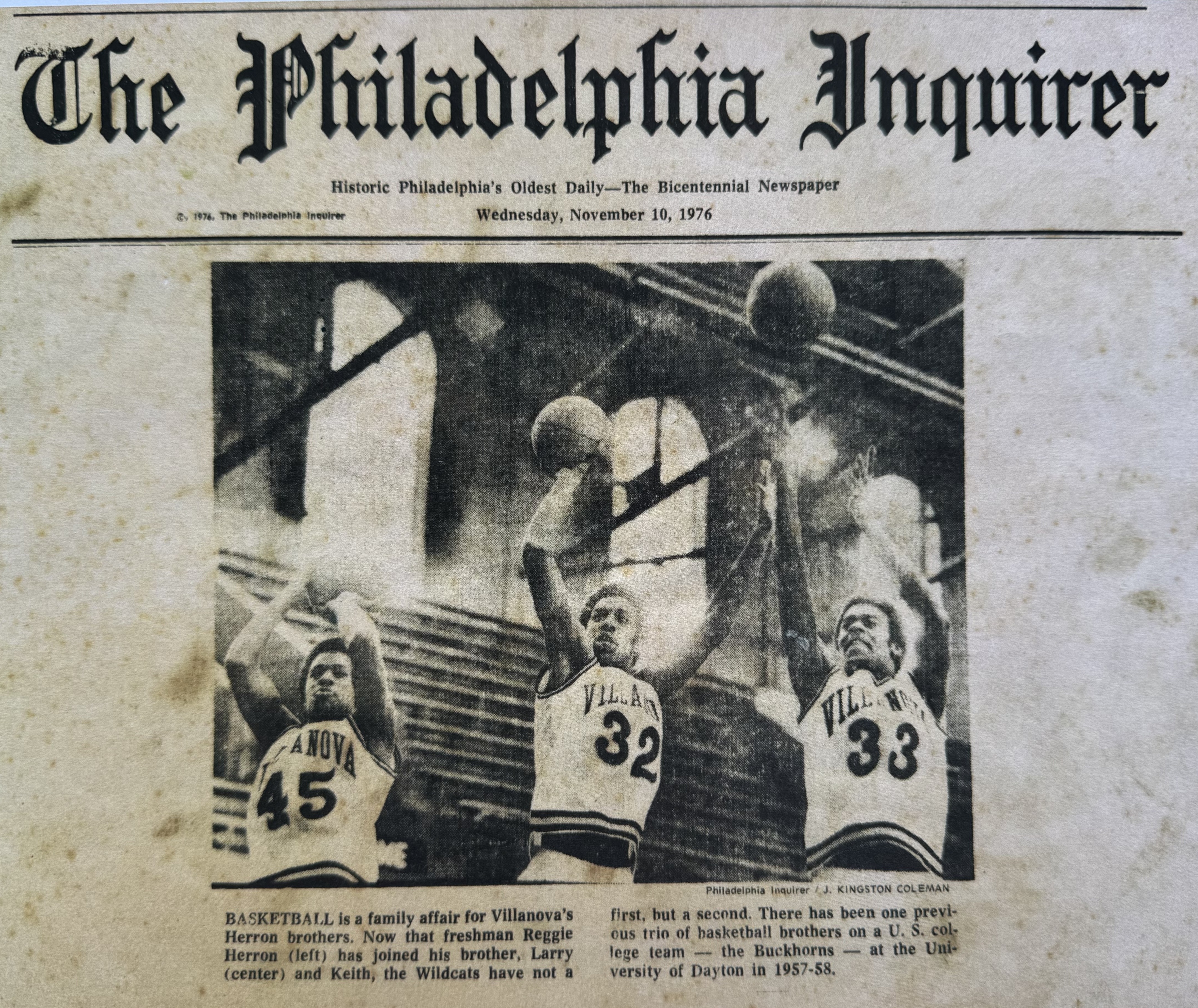 Philadelphia Inquirer front page showing all three Herron brothers in game action — #45, #32, and #33